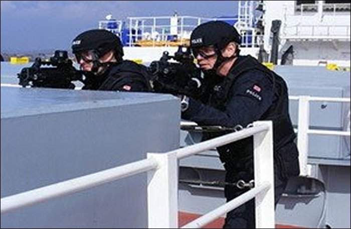 Training aboard a nuclear cargo ship.
Marine Escort Group (later Strategic Escort Group) officers training aboard a nuclear cargo ship.
Submitted By: Matthew Okuhara
